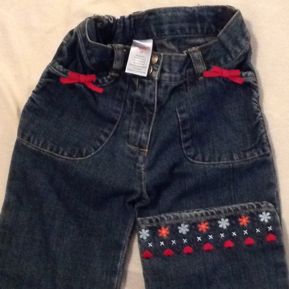 Pants, with red bow.